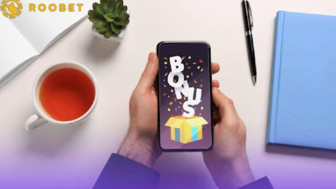 Roobet Rakeback Guide: How To Maximise Its Benefits Mobile casino player claiming bonus rewards